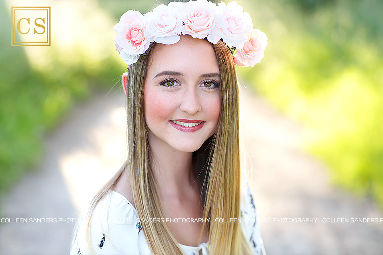 Spring senior pictures, oak trees, grass, blue dress, flower crowns, by El Dorado Hills senior photographer Colleen Sanders Photography.