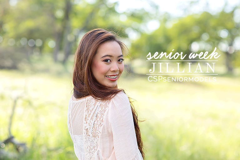 Oak Ridge senior looking flawless in hair pale pink shirt in the class of 2017, wearing a floral crown in El Dorado Hills, features oak trees and grasses, by senior photographer Colleen Sanders.