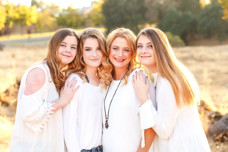 Fall family portraits in Folsom fields, oak trees, senior girl, boots, white sweater, mom by Colleen Sanders Photography.